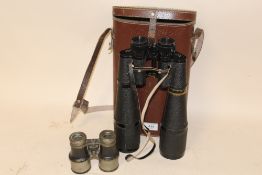 A PAIR OF LIEBERMAN & GORTZ 35X60 BINOCULARS TOGETHER WITH A SMALLER PAIR OF BINOCULARS