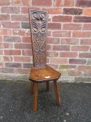 A CARVED OAK SPINNING STOOL