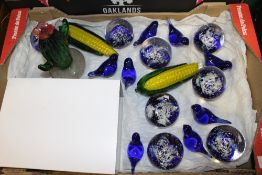 A LARGE BOX OF GLASS PAPERWEIGHTS