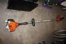 A STHIL FS56 R PETROL STRIMMER PLUS HARD HAT