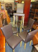 A MODERN GLASS TOPPED TABLE WITH CHROMED BASE AND SIX MODERN CHAIRS
