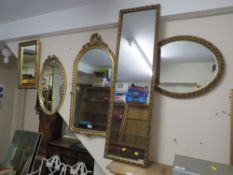 A GILT FRAMED ARCHED WALL MIRROR H-93 CM WITH FOUR ADDITIONAL GILT MIRRORS (5)