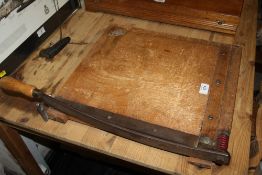 A VINTAGE WOODEN GUILLOTINE