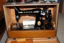 A CASED VINTAGE SINGER SEWING MACHINE