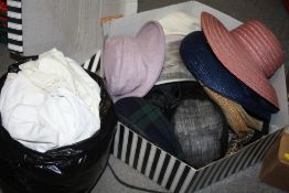 A BOX OF LADIES HATS TOGETHER WITH A BAG OF VINTAGE LINEN
