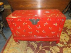 A MODERN RED PAINTED ORIENTAL STYLE BLANKET BOX W-89 CM