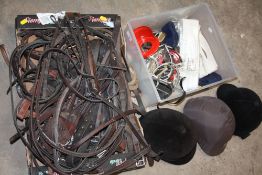 THREE BOXES OF HORSE RIDING EQUIPMENT ETC TO INCLUDE STRAPS, HELMET SADDLE ETC