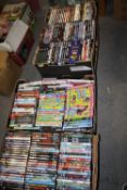 FOUR TRAYS OF DVDS