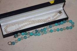 A BOXED TIFFANY STYLE NECKLACE, TOGETHER WITH A SILVER CLASPED PEARL NECKLACE (2)