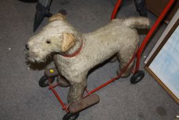 A VINTAGE CHILDS PUSH ALONG DOG TOY MADE BY LINES BROS OF IRELAND