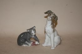 TWO NAO FIGURES OF A SEATED DOG AND A SEATED CAT