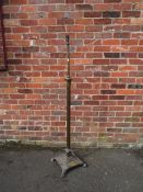 A VINTAGE BRASS EXTENDING CORINTHIAN COLUMN LAMP STANDARD