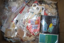 A BOX OF ASSORTED STAMPS