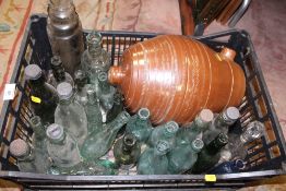 A COLLECTION OF VINTAGE GLASS BOTTLES TOGETHER WITH A STONEWARE BARREL