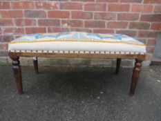 AN ANTIQUE MAHOGANY FRAMED STOOL