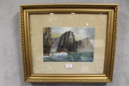 A GILT FRAMED AND GLAZED WATERCOLOUR OF A SEA CLIFF, INITIALLED K.M, TOGETHER WITH A WATERCOLOUR