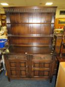 A VINTAGE DARK WELSH STYLE DRESSER W-120 CM