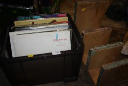 A BOX OF LP RECORDS AND SINGLES TO INCLUDE KING CRIMSON, PET SHOP BOYS ETC. TOGETHER WITH AN