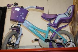 A CHILDS FROZEN BICYCLE