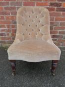 AN ANTIQUE BUTTON BACKED BEDROOM CHAIR