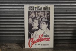 A REPRODUCTION CASA BLANCA FILM ADVERTISING PRINT ON BOARD, 67 X 98 CM