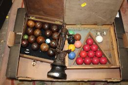 A BOX OF VINTAGE LAWN BOULES BALL, SPELTER FIGURE AND SNOOKER BALLS