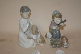 A LLADRO FIGURE OF A HUNTER BOY WITH DOG, TOGETHER WITH A LLADRO SEATED BOY AND DOG FIGURE (2)