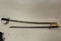 AN INDIAN SWORD TOGETHER WITH A REPRODUCTION WALL HANGING DISPLAY SHORT SWORD