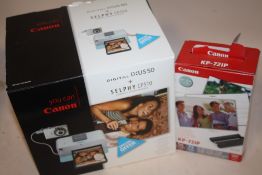 A CANON SELPHY PRINTER AND ACCESSORIES