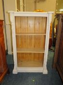 A VINTAGE PAINTED PINE OPEN BOOKCASE H-105 W-66 CM (2)