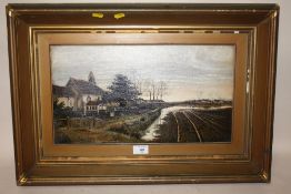 A GILT FRAMED OIL ON CANVAS DEPICTING A RURAL SCENE WITH CHURCH SIGNED A. BENNETT LOWER RIGHT SIZE -