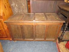 AN OAK FOUR PANEL COFFER W-112 CM