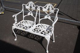 A PAINTED WHITE METAL GARDEN 2 SEATER BENCH