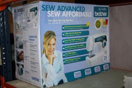A BOXED BROTHER XL-2600i ELECTRIC SEWING MACHINE