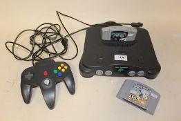 A NINTENDO 64 CONSOLE WITH 2 GAMES AND CONTROLLER A/F