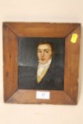 A SMALL PINE FRAMED OIL ON BOARD PORTRAIT STUDY OF A GENTLEMAN IN CLASSICAL DRESS A/F-BOARD SPLIT TO