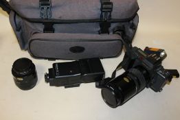 A YASHICA KYOCERA 320AF CAMERA IN CARRY CASE WITH ACCESSORIES