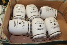 A BOX OF SIX RINGTONS TEA CADDIES