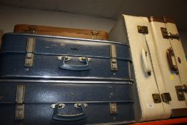FIVE VINTAGE SUITCASES