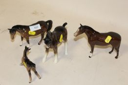 TWO BESWICK HORSES TOGETHER WITH ANOTHER AND A BESWICK FOAL