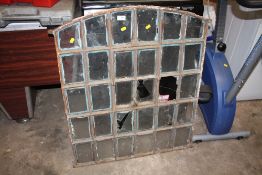 A METAL FRAMED SECTIONAL WINDOW 75 X 91 CM APPROX