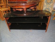 A MODERN GLASS TV STAND