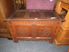A 19TH CENTURY OAK TRIPLE PANEL COFFER W- 103 CM