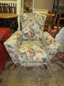 A VINTAGE FLORAL ARMCHAIR