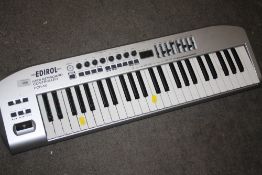 AN EDIROL MIDI KEYBOARD CONTROLLER PCR 50