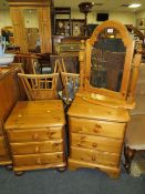 TWO HONEY PINE BEDSIDE CHESTS AND A MIRROR (3)