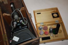 AN OAK CASED C.BAKER OF LONDON 5340 MICROSCOPE WITH A BOX OF ACCESSORIES