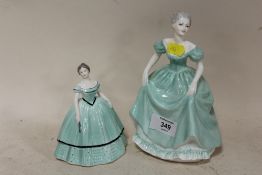 A COALPORT HENRIETTA FIGURE TOGETHER WITH A SMALLER COALPORT VERONIKA FIGURE