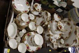 TWO TRAYS OF ROYAL ALBERT OLD COUNTRY ROSES CHINA, TO INCLUDE TEA POTS, TRIOS, DINING PLATES ETC.