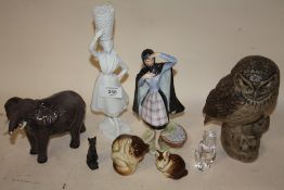 A COLLECTION OF MOSTLY CERAMIC FIGURES TO INCLUDE A LARGE POOLE OWL FIGURE, PORTUGUESE LADY FIGURES,